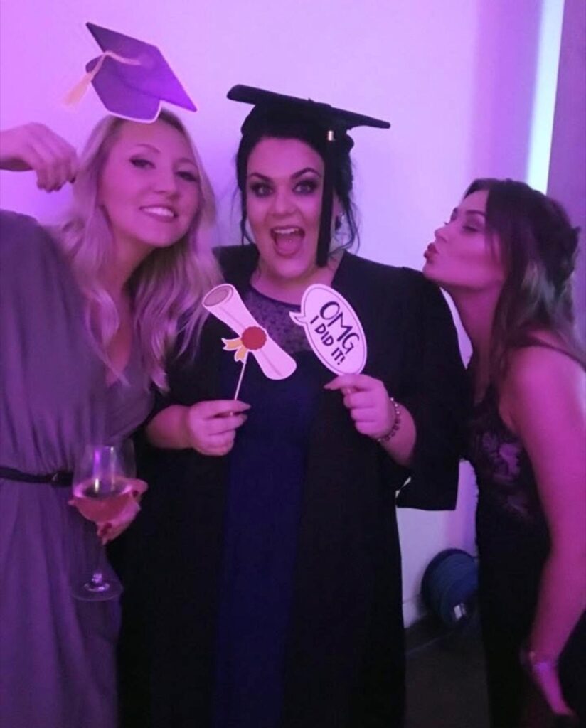 Jade celebrating her graduation with friends