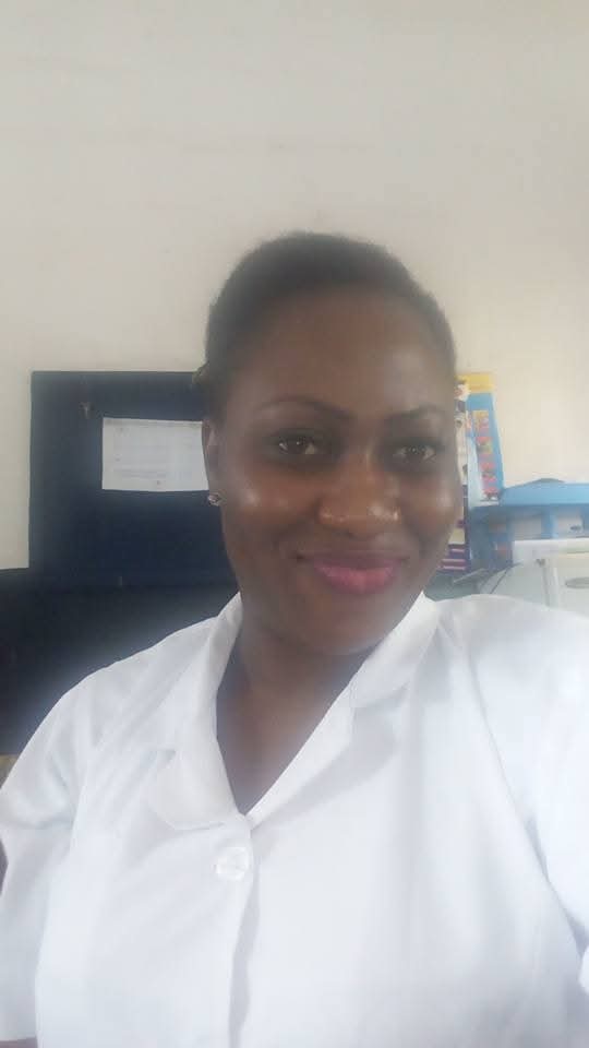 Tobi at work as a nurse in Nigeria
